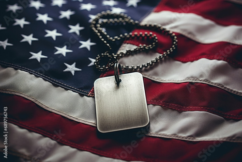 Military dog tag on american flag photo