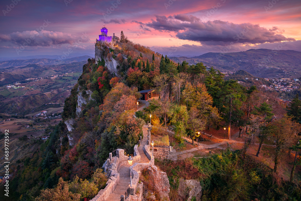Obraz na płótnie San Marino, Republic of San Marino, Italy. Aerial landscape image of San Marino, Italy at beautiful autumn sunset. w salonie