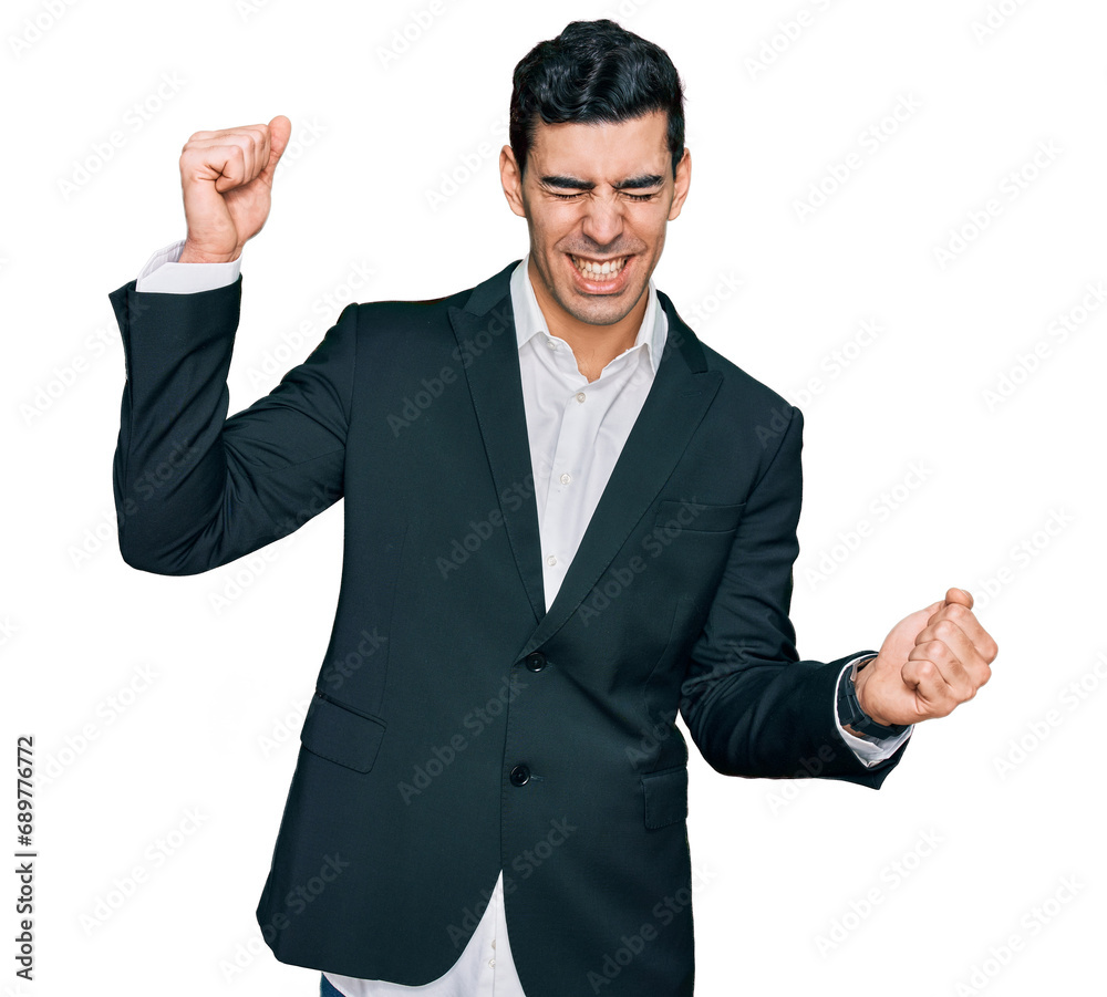 Handsome hispanic man wearing business clothes dancing happy and cheerful, smiling moving casual and confident listening to music Handsome hispanic man wearing business clothes dancing happy and cheerful, smiling moving casual and confident listening to music