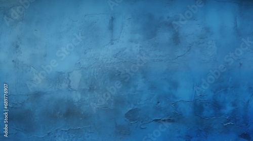 Abstract blue background. Dark blue grunge background. Rough grainy concrete wall surface texture. Deep blue concrete backdrop.