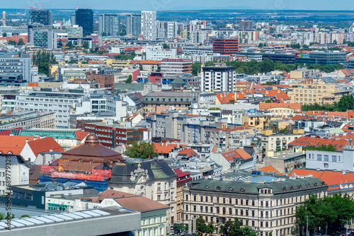 Aerial view of Bratislava city center capital of Slovakia with dense architecture during hot summer day