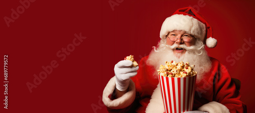 Santa Claus Watching a Movi...