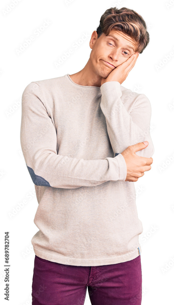 Young handsome man wearing casual clothes thinking looking tired and bored with depression problems with crossed arms. Young handsome man wearing casual clothes thinking looking tired and bored with depression problems with crossed arms.
