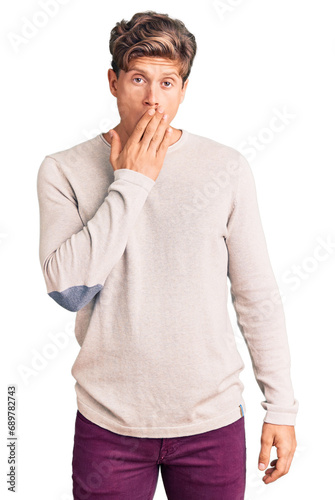 Young handsome man wearing casual clothes bored yawning tired covering mouth with hand. restless and sleepiness.