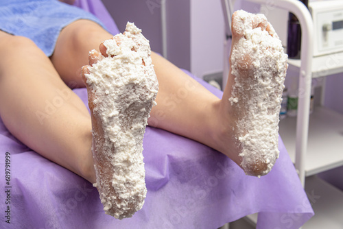 White alginate mask on the feet.  Foot treatment