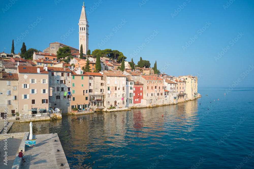 Old delightful Venetian style town on a peninsula in the sea water. Rovinj. Croatia. Shooting from a drone.