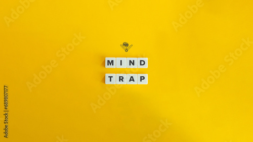 Mind Trap Banner and Concept Image. Block Letter Tiles on Yellow Background. Minimalist Aesthetics. photo