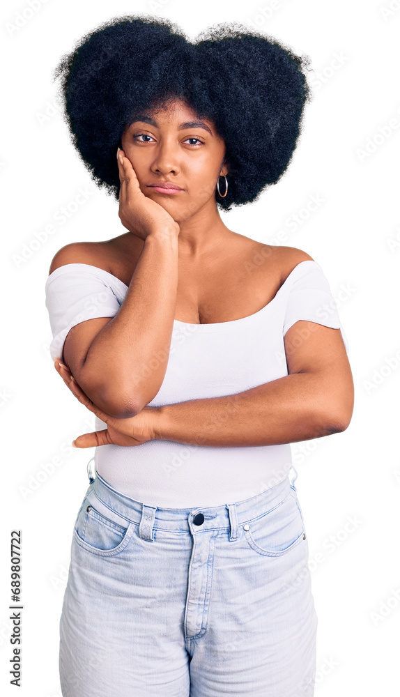 Young african american girl wearing casual clothes thinking looking tired and bored with depression problems with crossed arms. Young african american girl wearing casual clothes thinking looking tired and bored with depression problems with crossed arms.