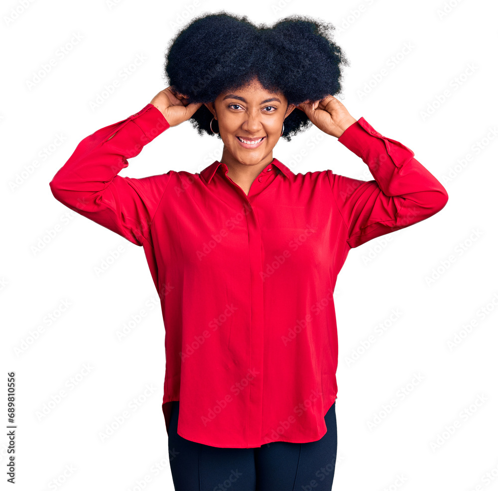 Young african american girl wearing casual clothes smiling pulling ears with fingers, funny gesture. audition problem Young african american girl wearing casual clothes smiling pulling ears with fingers, funny gesture. audition problem