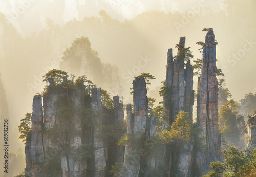 Aerial view of Zhangjiajie National Forest Park at sunset on Avatar mountains, located in Zhangjiajie, Hunan Province, China.