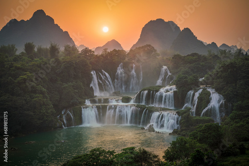 Aerial view of Ban Gioc Detian Falls along the Quay Son River on the Karst hills of Daxin County, Guangxi, China. photo