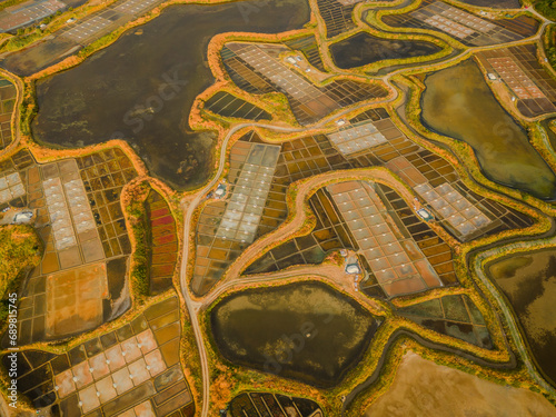 Aerial view of salt marshes at sunrise in Guérande, Loire-Atlantique, France.