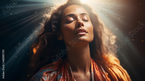 A woman in a calm spiritual state. The light around her