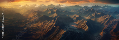 landscape of a mountain range, shot from a helicopter at sunset Generative ai © Desig4You