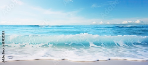 Blue clear sea and sky Ocean with waves and clear blue sky selective focus. Copyspace image. Square banner. Header for website template