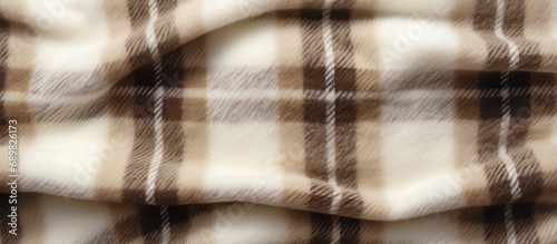beige brown woolen plaid is...