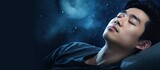 asian man in bed suffering insomnia and sleep disorder thinking about his problem at night. Copyspace image. Square banner. Header for website template