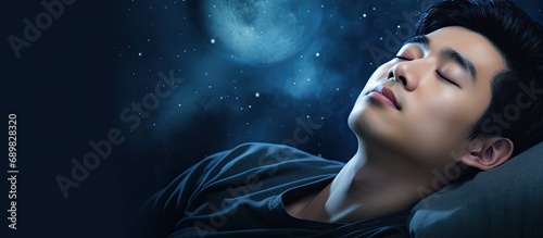 asian man in bed suffering insomnia and sleep disorder thinking about his problem at night. Copyspace image. Square banner. Header for website template photo