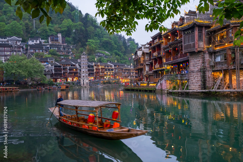 View of Fenghuang, a small town along the river in Fenghuang County, Xiangxi Tujia and Miao Autonomous Prefecture, Hunan, China. photo