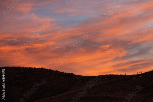 sunrise over the mountain with colorful sky © James