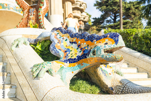 Barcelona Park Guell of Gaudi Snake and four Catalan bars in modernism mosaic