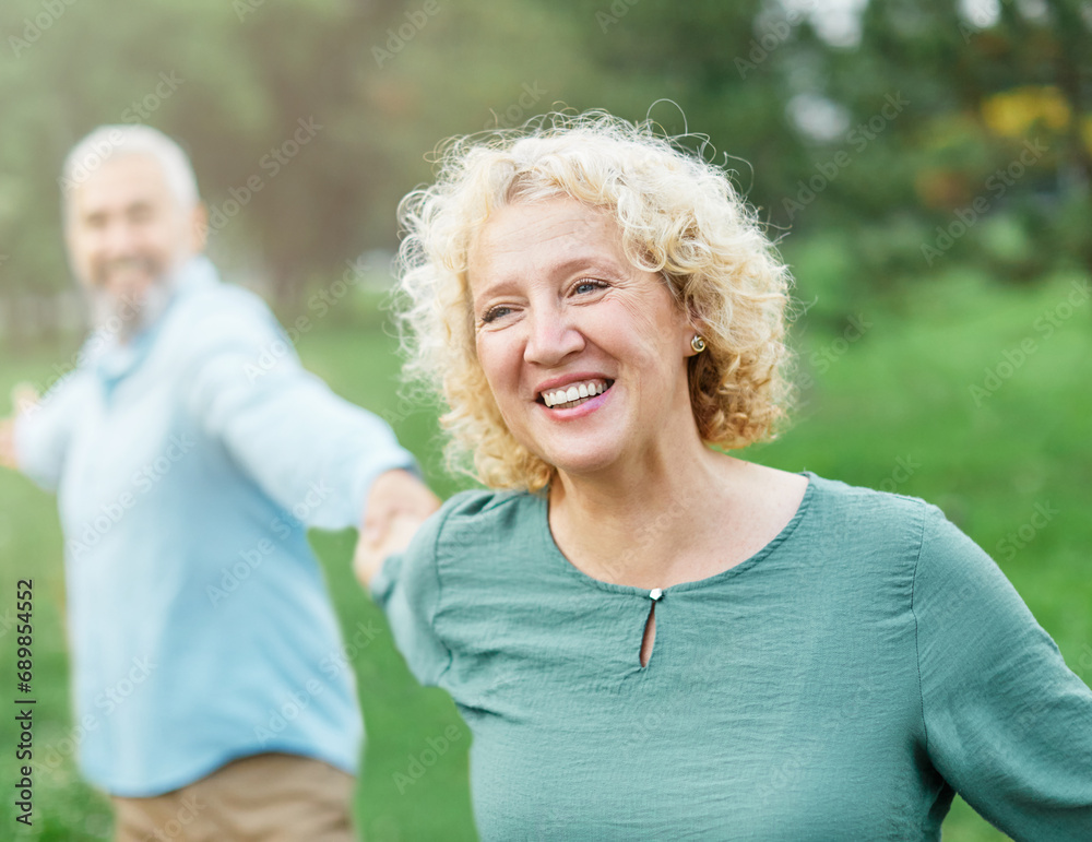woman man couple happy together mature active bonding love outdoor run running portrait walking leisure park fun smiling park old nature wife happiness senior lifestyle mid middle aged adult vitality woman man couple happy together mature active bonding love outdoor run running portrait walking leisure park fun smiling park old nature wife happiness senior lifestyle mid middle aged adult vitality