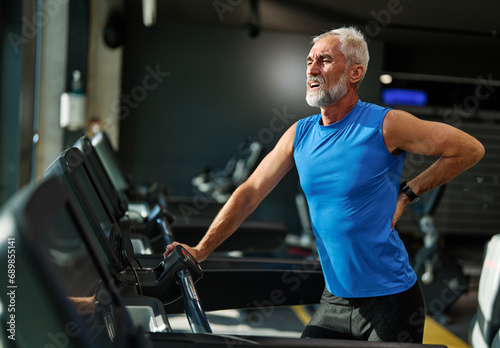 gym sport fitness exercising training mature man running cardio treadmill tired exhausted resting fatigue break challenge healthy active workout run