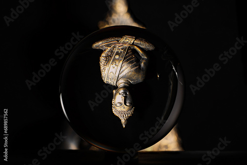 buddha statue in glass ball
