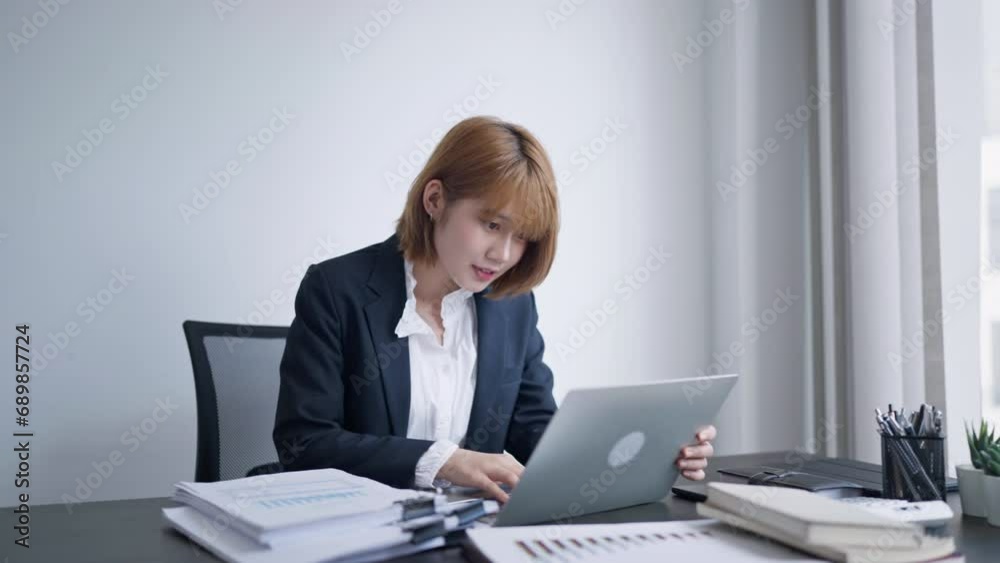 Business women celebrating job successful, reading good news on laptop, happy and excited gesture. Business women celebrating job successful, reading good news on laptop, happy and excited gesture.