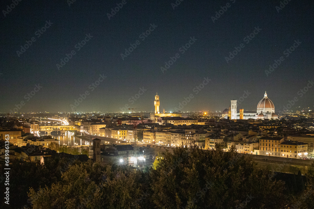 The Cathedral of Santa Maria del Fiore as seen from Piazzale Michelangelo in Florence, Italy at night.