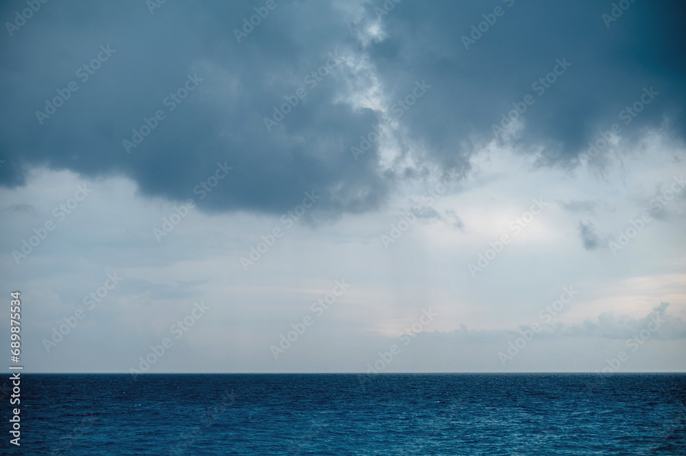 Blue sea and cloudy sky before the storm in Cyprus. Natural composition. Toned.