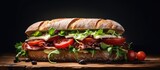 A sandwich on a wooden table in natural lighting.