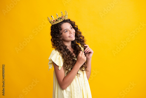 Beauty teen girl queen wear crown. Child in princess diadem. Happy teenager, positive and smiling emotions of teen girl.