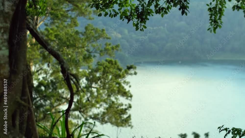 Lake Danau Buyan in Mountains of Bali, Indonesia. Hills of north Bali Lake Danau Buyan in Mountains of Bali, Indonesia. Hills of north Bali