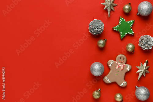 Gingerbread cookie with Christmas decor on red background
