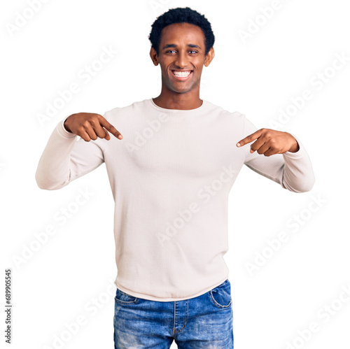 African handsome man wearing casual winter sweater looking confident with smile on face, pointing oneself with fingers proud and happy.