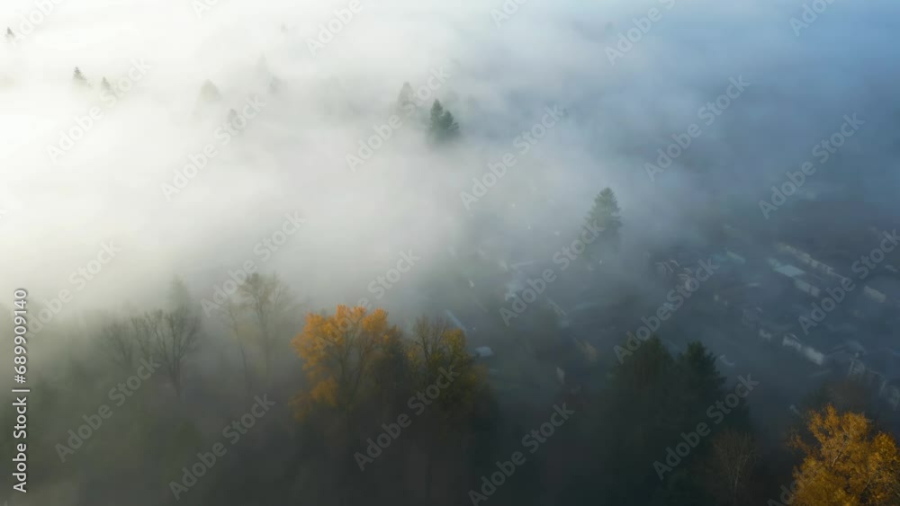 Neighborhood streets and homes covered in fog. Residential City suburb. Aerial View. BC, Canada. Neighborhood streets and homes covered in fog. Residential City suburb. Aerial View. BC, Canada.