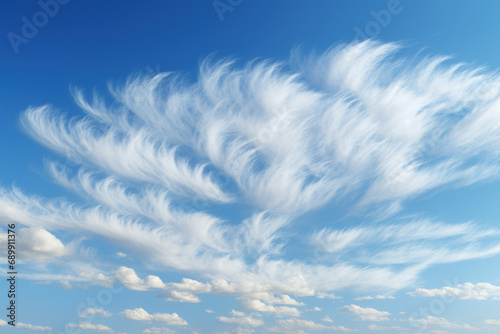 Wispy cirrus clouds streaking across a brilliant blue sky, creating a delicate contrast of textures. Concept of atmospheric beauty and celestial canvas. Generative Ai.
