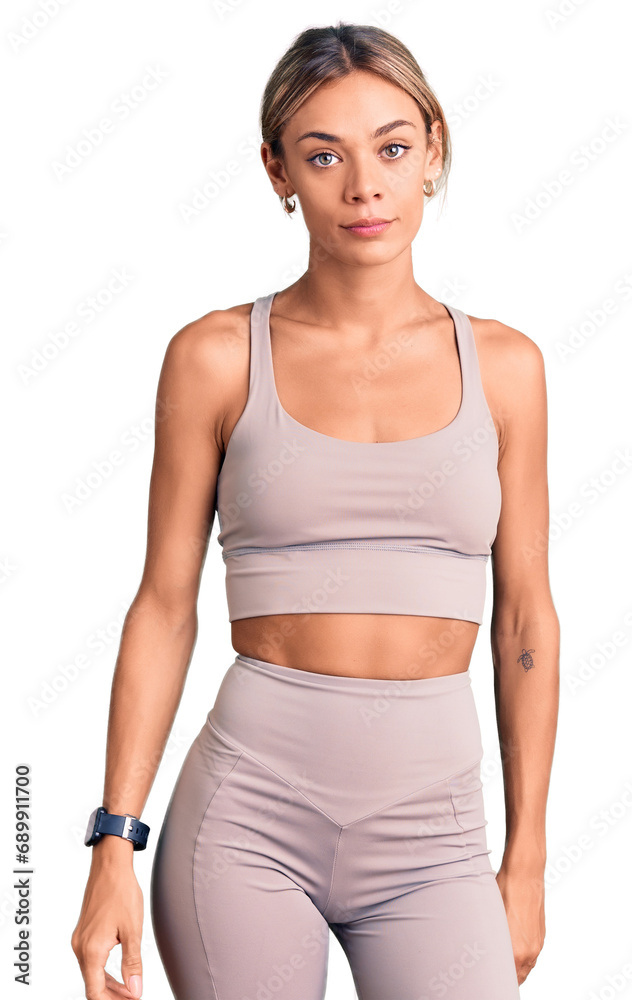 Beautiful caucasian woman wearing sportswear looking sleepy and tired, exhausted for fatigue and hangover, lazy eyes in the morning. Beautiful caucasian woman wearing sportswear looking sleepy and tired, exhausted for fatigue and hangover, lazy eyes in the morning.