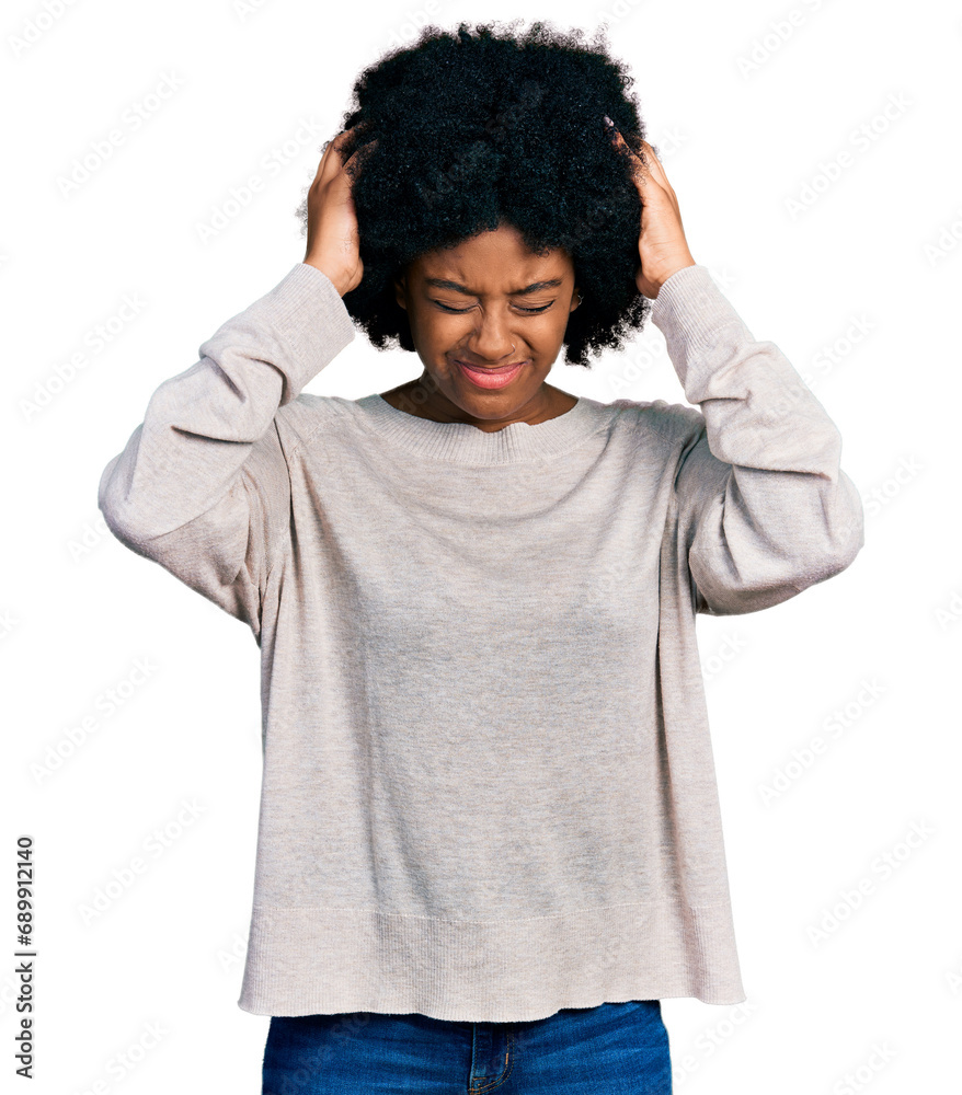 Young african american woman wearing casual clothes suffering from headache desperate and stressed because pain and migraine. hands on head. Young african american woman wearing casual clothes suffering from headache desperate and stressed because pain and migraine. hands on head.