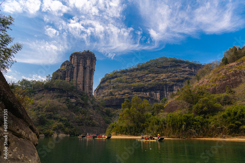 Horizontal image of the Wuyishan Yufu Peak  Fujian  China behind the rock