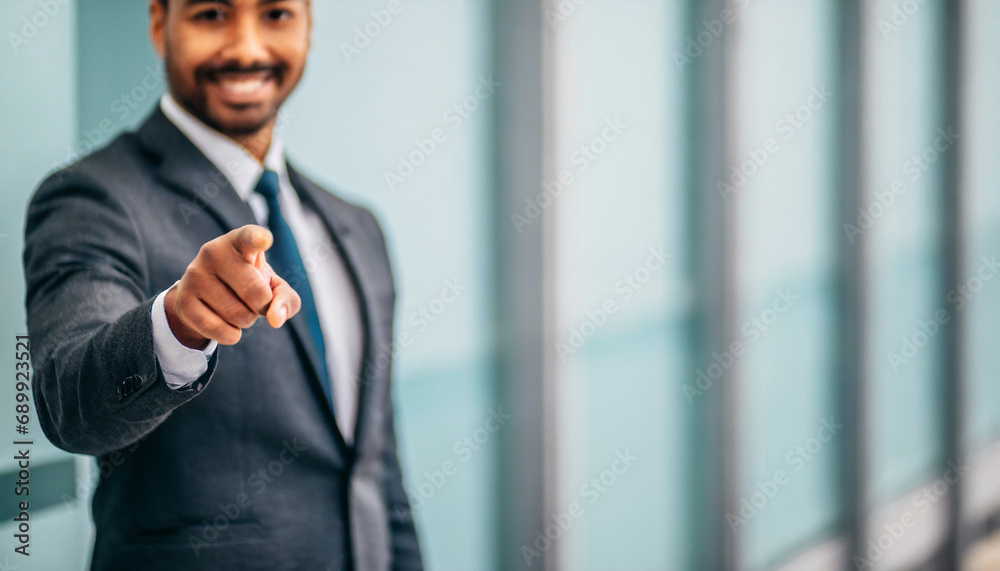 businessman pointing directly at viewer with copy space, conveying authority and direction in business communication businessman pointing directly at viewer with copy space, conveying authority and direction in business communication