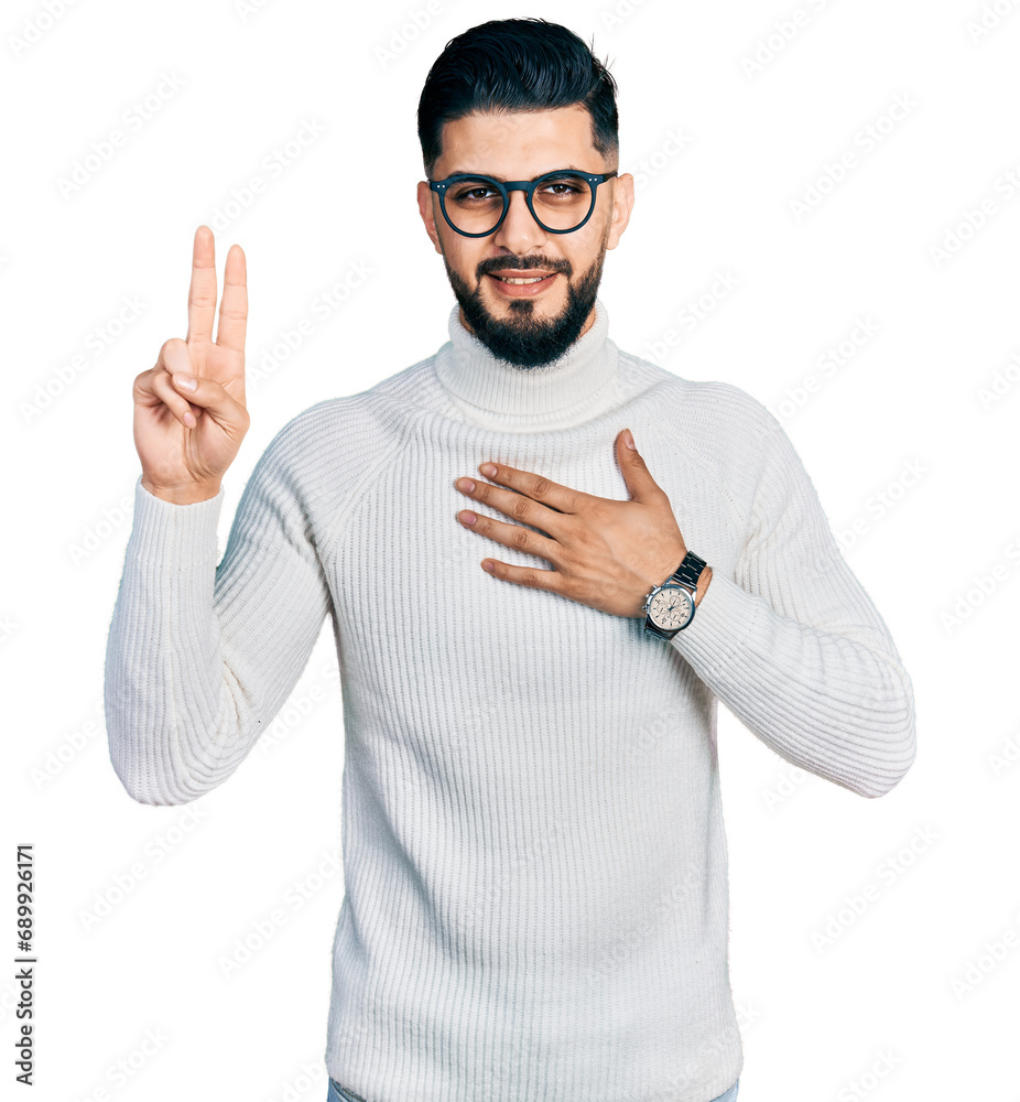 Young arab man with beard wearing elegant turtleneck sweater and glasses smiling swearing with hand on chest and fingers up, making a loyalty promise oath Young arab man with beard wearing elegant turtleneck sweater and glasses smiling swearing with hand on chest and fingers up, making a loyalty promise oath