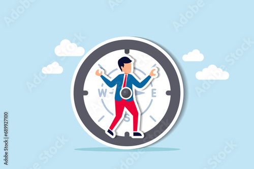 Decision making to lead company to success direction, leadership or determination, career guidance or job opportunity concept, businessman at the center of magnetic compass pointing to guide direction