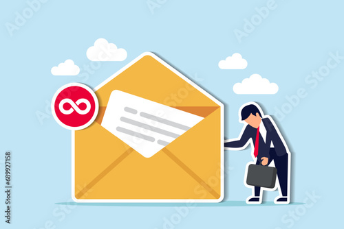 Busy email overload, inefficient communication, anxiety, exhausted or burnout from too many messages concept, desperate hopelessness businessman with his inbox with infinity unread emails.