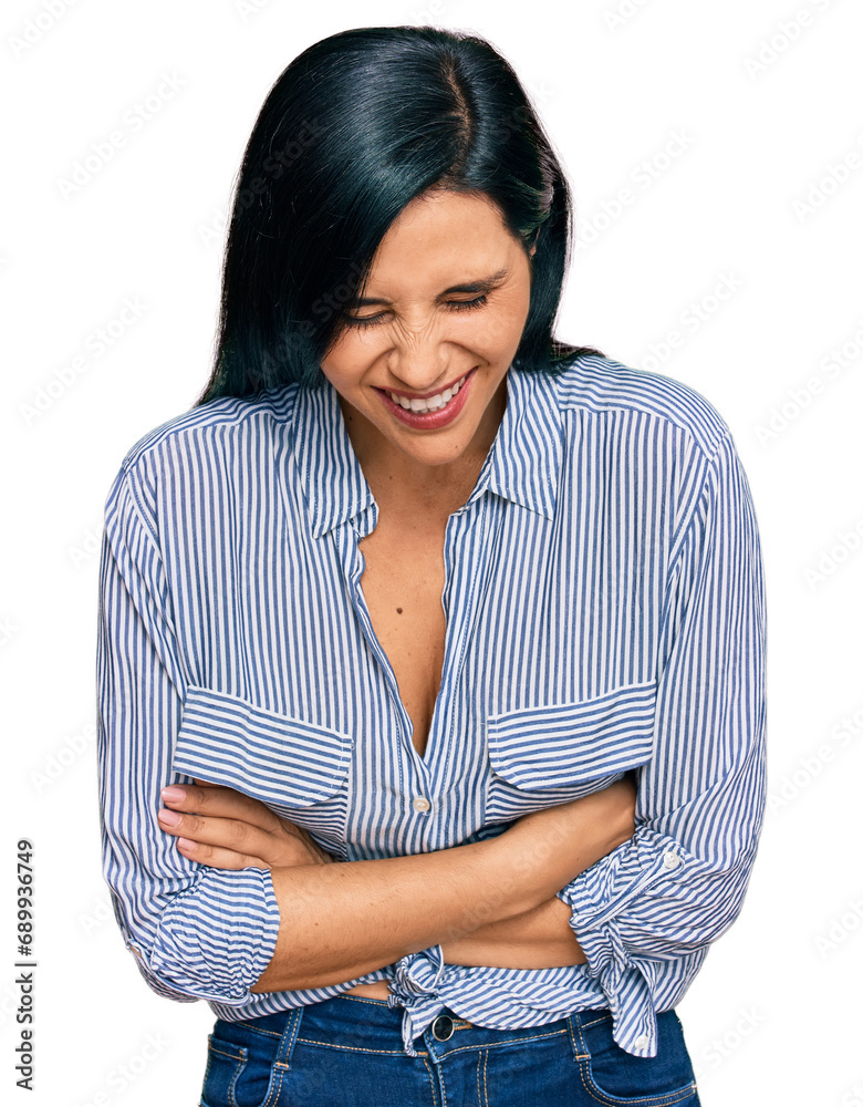 Young caucasian woman wearing casual clothes smiling and laughing hard out loud because funny crazy joke with hands on body. Young caucasian woman wearing casual clothes smiling and laughing hard out loud because funny crazy joke with hands on body.