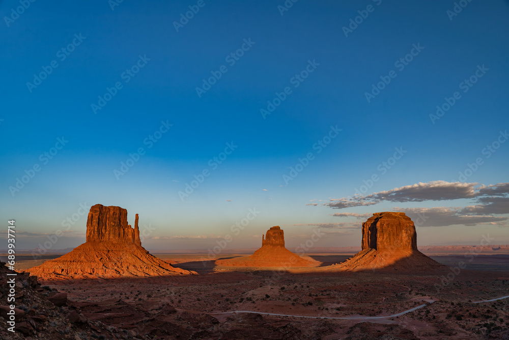 Monument Valley illuminated by the setting sun Monument Valley illuminated by the setting sun