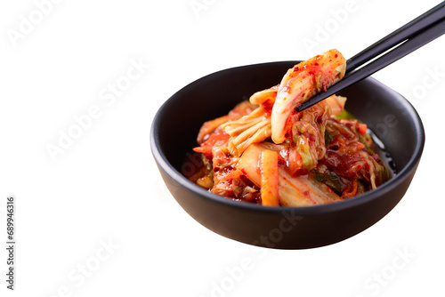 Korean kimchi cabbage eating by chopsticks photo