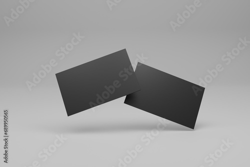 two black blank business cards for mock up, 3d rendering	
