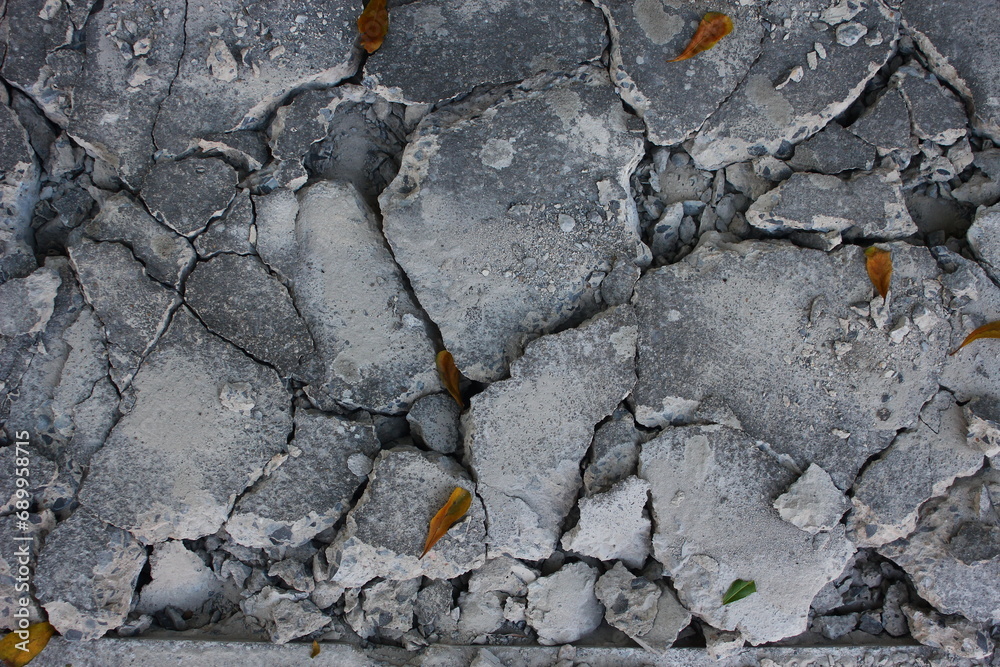 cracked concrete wall background, closeup of photo with selective focus cracked concrete wall background, closeup of photo with selective focus